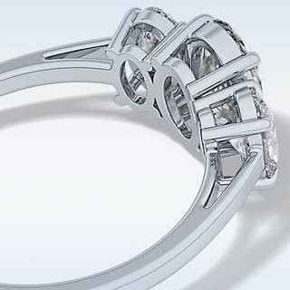 Elegant 0.91 CT Three Stones Engagement Ring Featuring Oval Moissanite