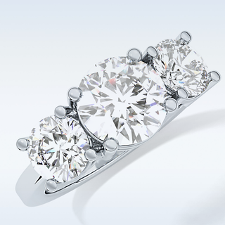 Elegant 1.82 CT Three Stones Engagement Ring Featuring Round Moissanite