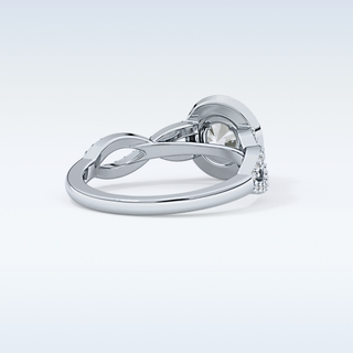0.8 CT Double Halo & Twisted Pave Engagement Ring Featuring Round Moissanite