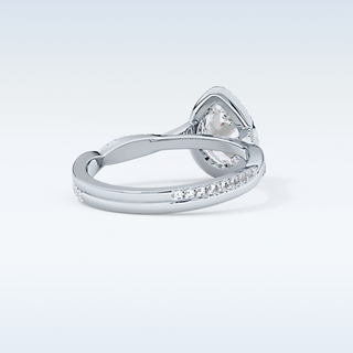0.81 CT Halo & Pave Engagement Ring Featuring Pear Moissanite