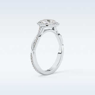 0.81 CT Halo & Pave Engagement Ring Featuring Pear Moissanite
