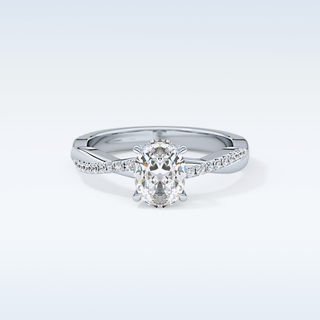 0.83 CT Criss Cross & Pave Engagement Ring Featuring Oval Moissanite