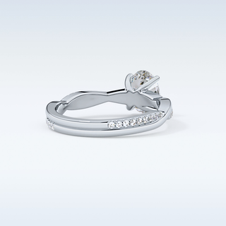 0.83 CT Criss Cross & Pave Engagement Ring Featuring Oval Moissanite