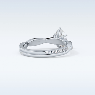 0.81 CT Criss Cross & Pave Engagement Ring Featuring Pear Moissanite