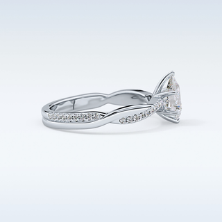 0.81 CT Criss Cross & Pave Engagement Ring Featuring Pear Moissanite