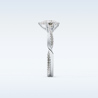 0.81 CT Criss Cross & Pave Engagement Ring Featuring Pear Moissanite