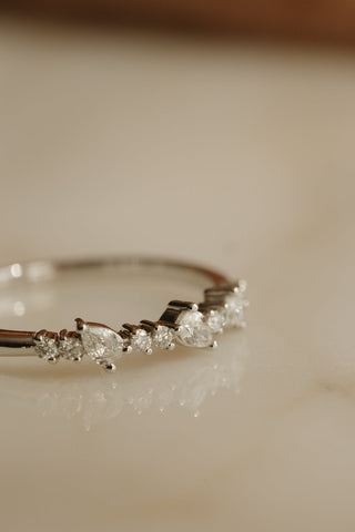 0.13 TCW Round Twisted Moissanite Wedding Band