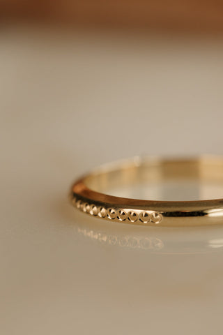 0.13 TCW Round Twisted Moissanite Wedding Band