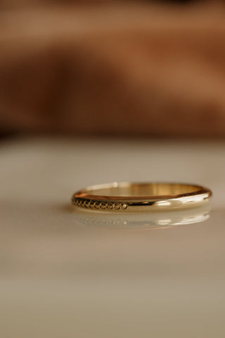 0.13 TCW Round Twisted Moissanite Wedding Band