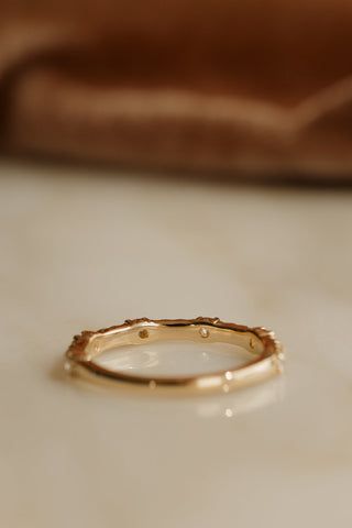 0.13 TCW Round Twisted Moissanite Wedding Band