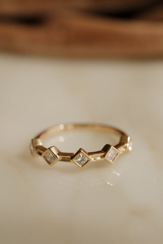 0.13 TCW Round Twisted Moissanite Wedding Band