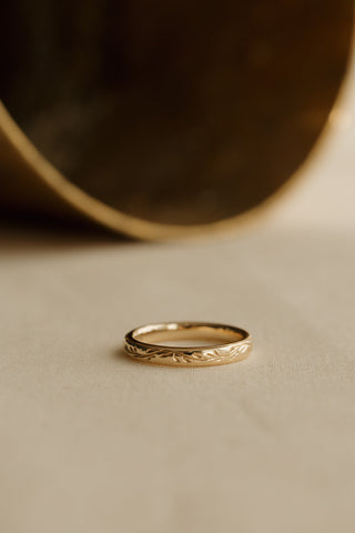 0.13 TCW Round Twisted Moissanite Wedding Band