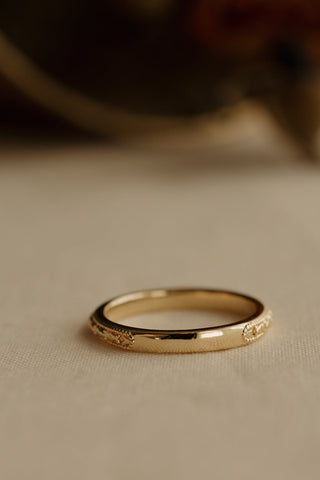 0.13 TCW Round Twisted Moissanite Wedding Band