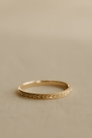 0.13 TCW Round Twisted Moissanite Wedding Band