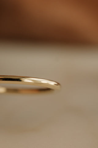 0.13 TCW Round Twisted Moissanite Wedding Band
