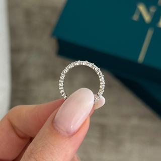 0.13 TCW Round Twisted DEF/VVS Lab Grown Diamond Wedding Band