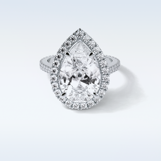6.15 CT Halo Engagement Ring Featuring Pear Moissanite 1
