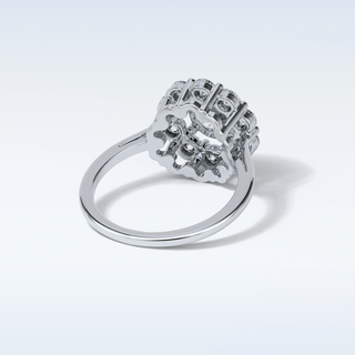 1.0 CT Halo Engagement Ring Featuring Round Moissanite