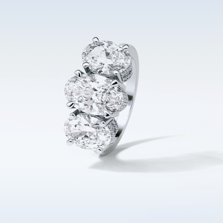2.35 CT 3 Stone Engagement Ring Featuring Oval Moissanite