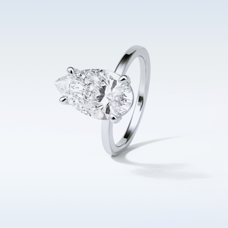 5.6 CT Hidden Multi Cut Engagement Ring Featuring Pear Moissanite