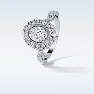 1.33 Halo Engagement Ring Featuring Oval Moissanite