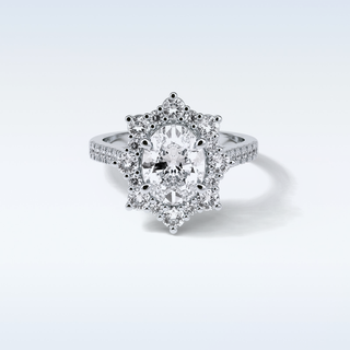 1.91 Cluster Engagement Ring Featuring Oval Moissanite