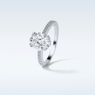 1.60 Pave Engagement Ring Featuring Oval Moissanite