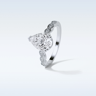 1.93 Pave Engagement Ring Featuring Pear Moissanite