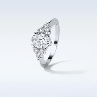 1.33 CT Cluster Engagement Ring Featuring Oval Moissanite