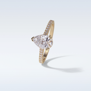 1.33 CT Pave Engagement Ring Featuring Pear Moissanite
