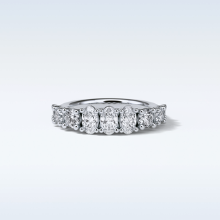 1.2 TCW Half Eternity Wedding Band Featuring Oval And Round Moissanite