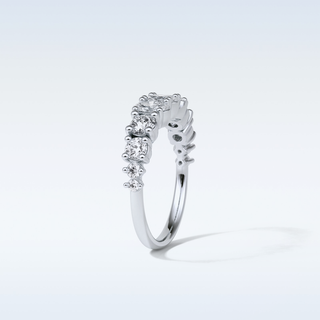 1.2 TCW Half Eternity Wedding Band Featuring Oval And Round Moissanite
