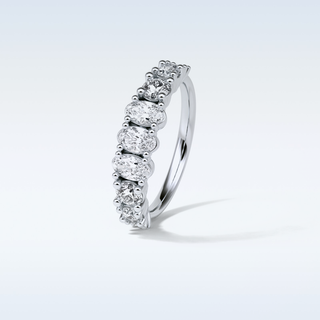 1.2 TCW Half Eternity Wedding Band Featuring Oval And Round Moissanite