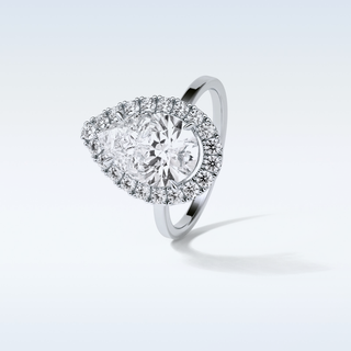 3.10 CT Halo Engagement Ring Featuring Pear Moissanite