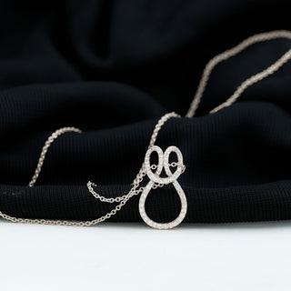 0.18 TCW Round Twisted Infinity Moissanite Necklace 4