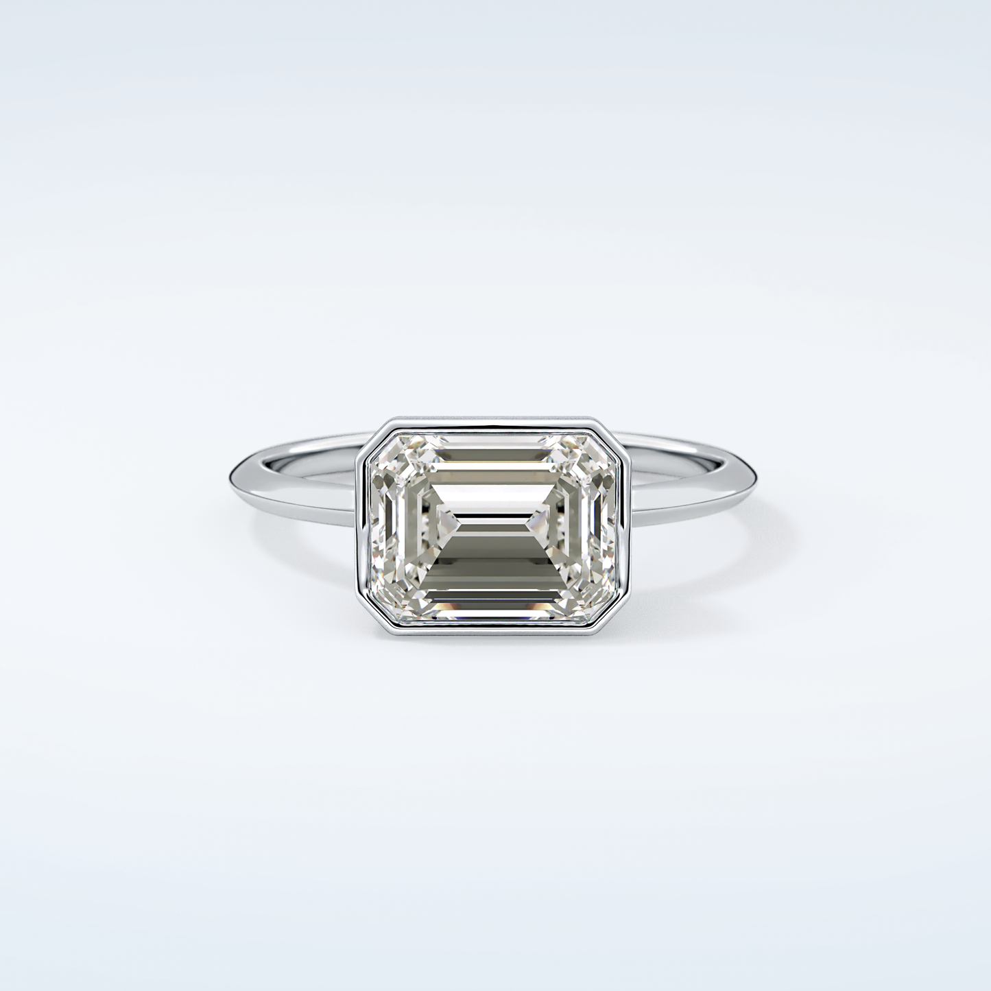 1.5 CT East West Emerald Cut Bezel Style Moissanite Engagement Ring