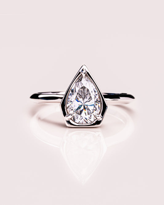 1.33 CT Pear Cut Bezel Solitaire Moissanite Engagement Ring 1